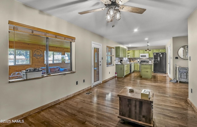 1384 W Canvasback Trl, Williams, AZ 86046 - living area featuring ceiling fan and dark wood-style flooring