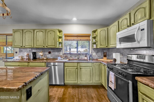 1384 W Canvasback Trl, Williams, AZ 86046 - kitchen featuring stainless steel appliances, green cabinets, open shelves, decorative backsplash, and recessed lighting