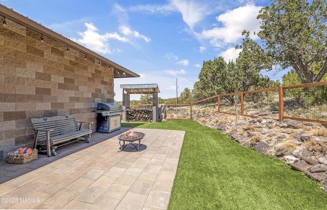1384 W Canvasback Trl, Williams, AZ 86046 - view of patio / terrace with a grill and a fire pit