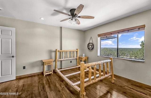 1384 W Canvasback Trl, Williams, AZ 86046 - bedroom featuring wood finished floors, recessed lighting, and a ceiling fan