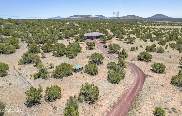 1384 W Canvasback Trl, Williams, AZ 86046 - aerial view of property and surrounding area featuring a mountainous background and a desert landscape