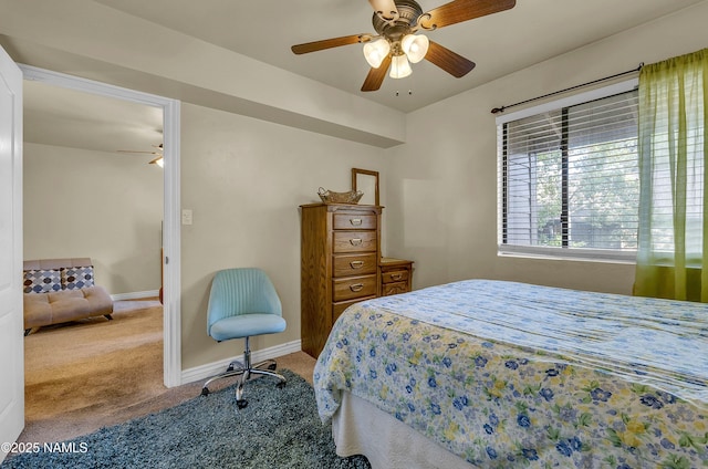 3200 S Litzler Dr Unit 3-212, Flagstaff, AZ 86005 - carpeted bedroom with baseboards and ceiling fan