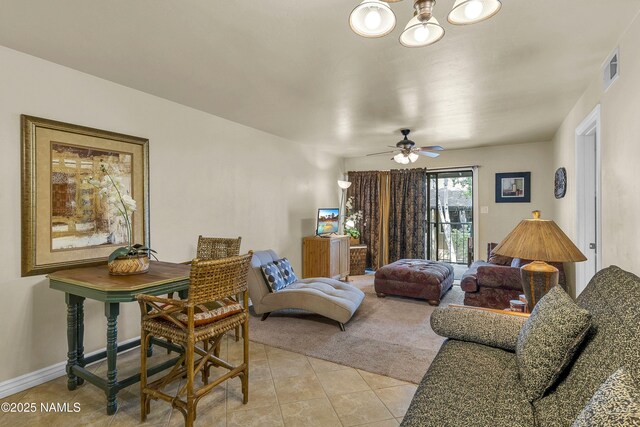 3200 S Litzler Dr Unit 3-212, Flagstaff, AZ 86005 - living room featuring light tile patterned floors, a chandelier, and ceiling fan