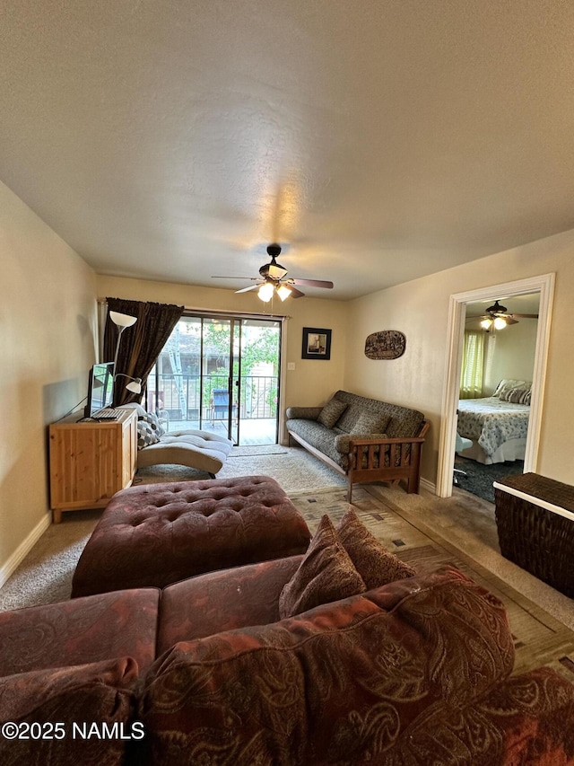 3200 S Litzler Dr Unit 3-212, Flagstaff, AZ 86005 - living area featuring carpet floors, ceiling fan, and baseboards