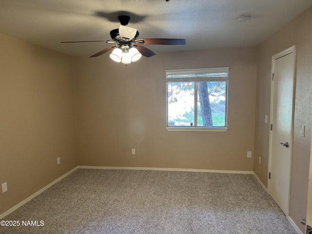 1385 W University Ave Unit 196, Flagstaff, AZ 86001 - spare room featuring carpet floors, a ceiling fan, baseboards, and a smoke detector
