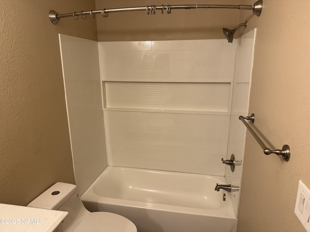 1385 W University Ave Unit 196, Flagstaff, AZ 86001 - full bath featuring toilet, a textured wall, and bathing tub / shower combination