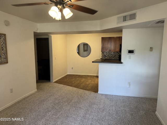 1385 W University Ave Unit 196, Flagstaff, AZ 86001 - spare room with ceiling fan, dark carpet, and baseboards