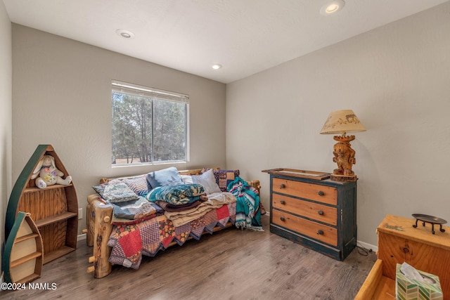 bedroom featuring dark hardwood / wood-style floors