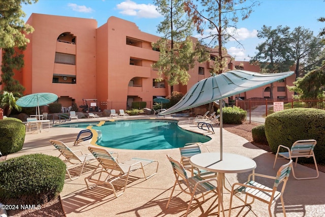 view of pool with a patio