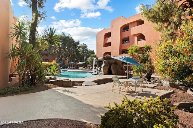 view of pool featuring a patio area