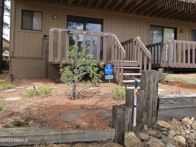 2422 N Whispering Pines Way, Flagstaff, AZ 86004 - doorway to property featuring a deck