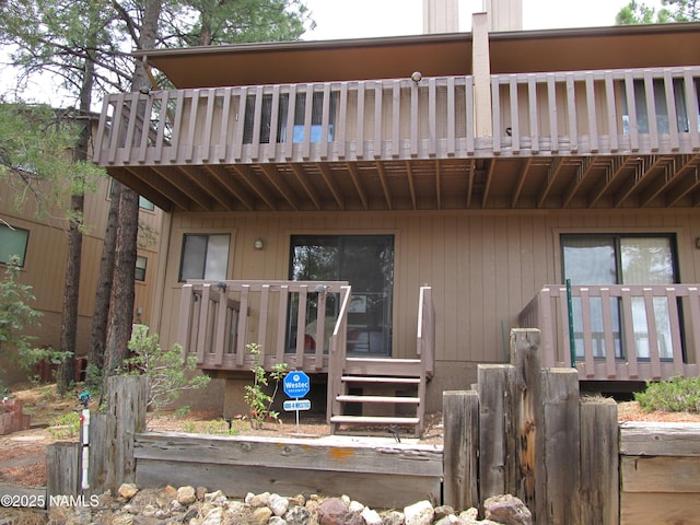 2422 N Whispering Pines Way, Flagstaff, AZ 86004 - rear view of house with a balcony