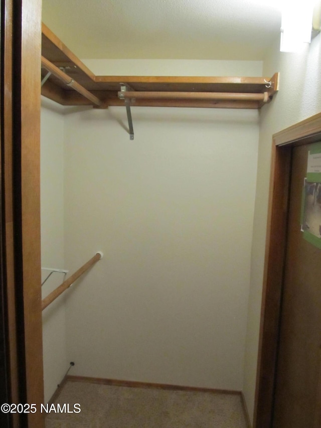 2422 N Whispering Pines Way, Flagstaff, AZ 86004 - walk in closet with carpet flooring