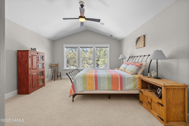 bedroom with visible vents, light carpet, lofted ceiling, a ceiling fan, and baseboards