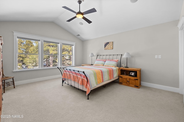 bedroom with baseboards, carpet, a ceiling fan, and vaulted ceiling