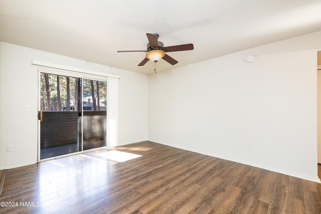 empty room featuring hardwood / wood-style floors and ceiling fan