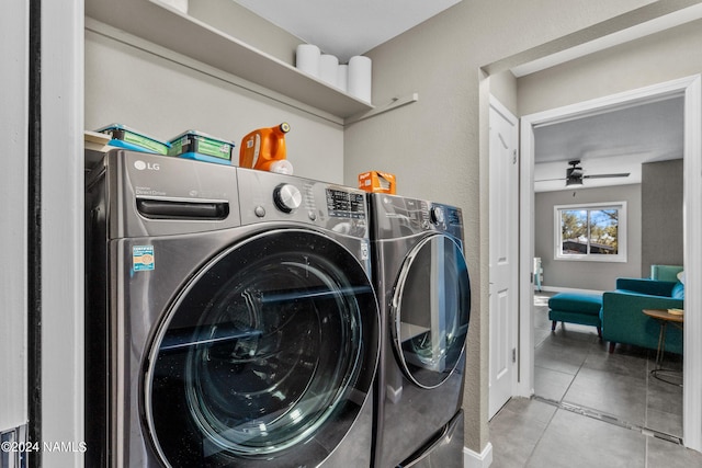 laundry room featuring independent washer and dryer, light tile patterned floors, and ceiling fan