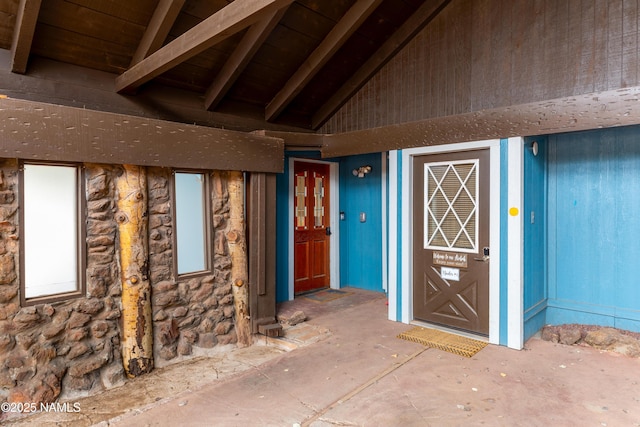 view of exterior entry with stone siding