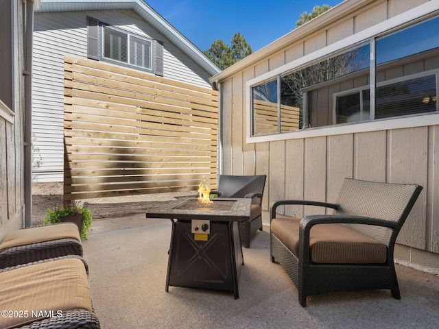 view of patio featuring a fire pit