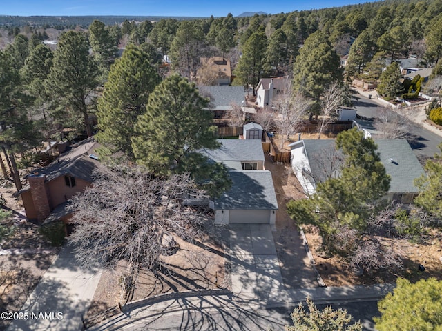 bird's eye view with a view of trees