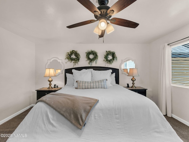 bedroom with ceiling fan, carpet floors, and baseboards