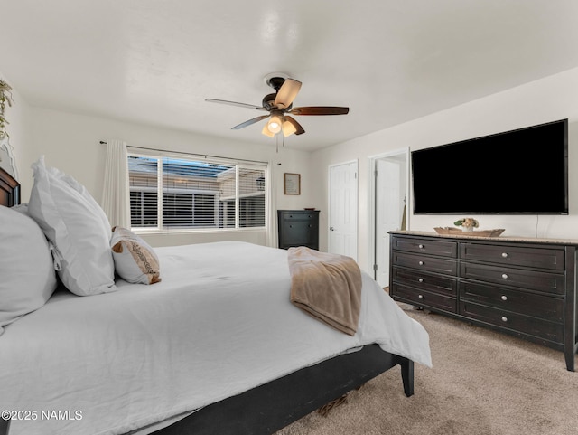 bedroom featuring carpet floors and a ceiling fan