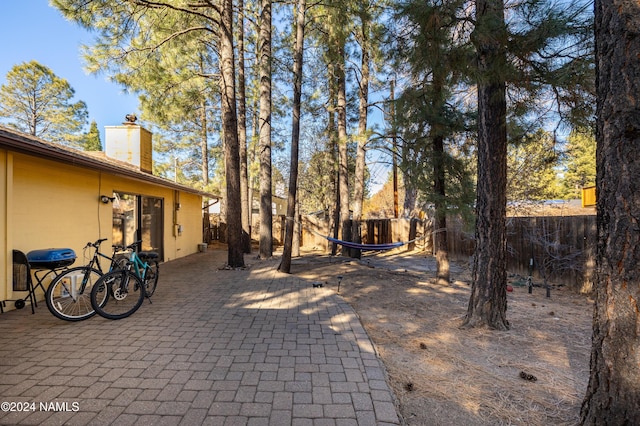 view of yard featuring a fenced backyard and a patio