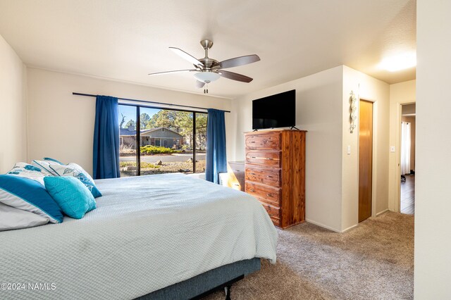 bedroom featuring carpet and a ceiling fan