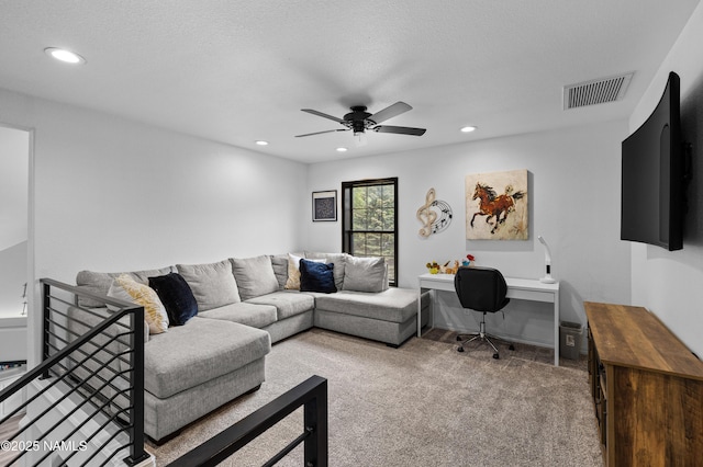 706 N Hulet Ln, Flagstaff, AZ 86004 - living room with carpet flooring, a desk, ceiling fan, and recessed lighting