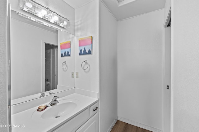 706 N Hulet Ln, Flagstaff, AZ 86004 - bathroom with vanity and wood finished floors