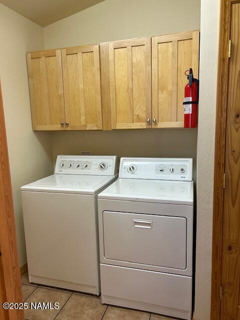 39 E Oak Dr, Munds Park, AZ 86017 - laundry room featuring cabinet space, independent washer and dryer, and light tile patterned floors
