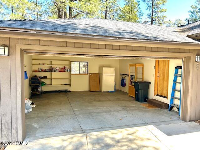 39 E Oak Dr, Munds Park, AZ 86017 - garage with freestanding refrigerator