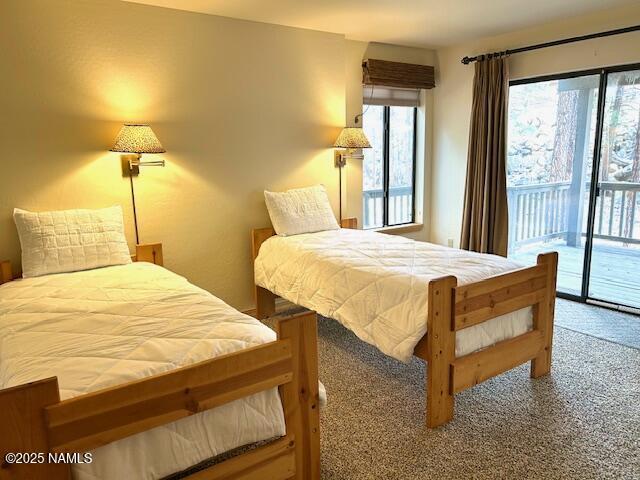 39 E Oak Dr, Munds Park, AZ 86017 - bedroom featuring access to outside and carpet