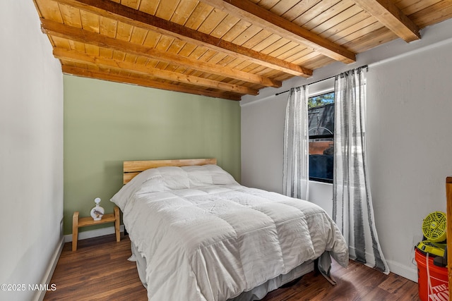 5552 White Tail Ln, Flagstaff, AZ 86005 - bedroom featuring baseboards, beam ceiling, wooden ceiling, and wood finished floors