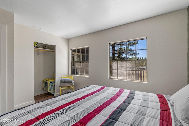 5552 White Tail Ln, Flagstaff, AZ 86005 - bedroom with a closet and wood finished floors