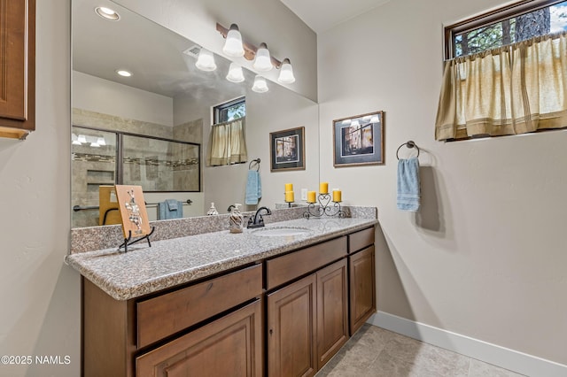 3480 W Lead Rope, Flagstaff, AZ 86005 - full bathroom featuring baseboards, vanity, a shower stall, tile patterned flooring, and recessed lighting