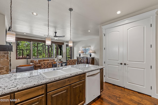 3480 W Lead Rope, Flagstaff, AZ 86005 - kitchen featuring white dishwasher, a sink, a ceiling fan, dark wood finished floors, and recessed lighting
