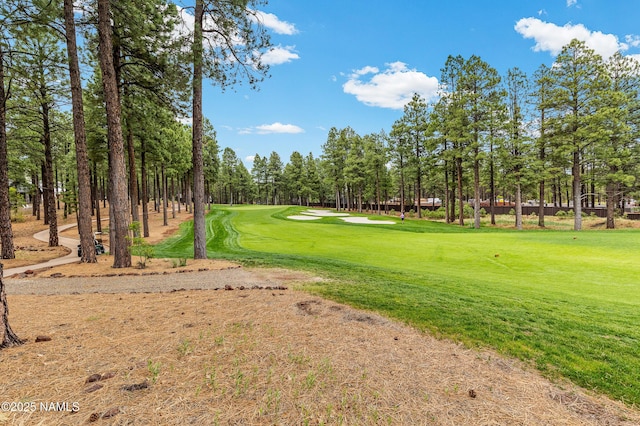 3480 W Lead Rope, Flagstaff, AZ 86005 - view of community with a lawn, view of golf course, and view of wooded area