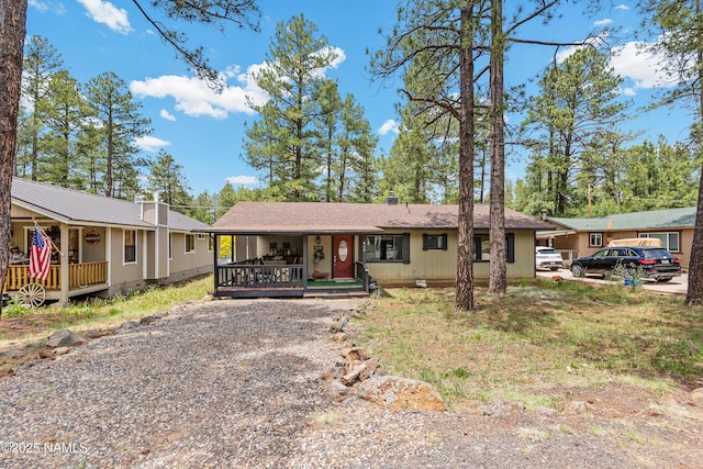 840 E Caribou Rd, Munds Park, AZ 86017 - ranch-style house with covered porch