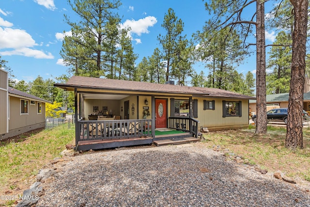 840 E Caribou Rd, Munds Park, AZ 86017 - single story home with covered porch