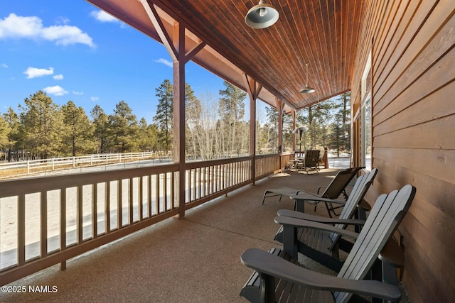 view of patio featuring fence