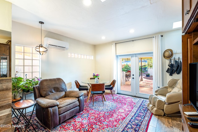1125 Trails End Dr, Sedona, AZ 86336 - living room featuring an AC wall unit, french doors, wood finished floors, and recessed lighting