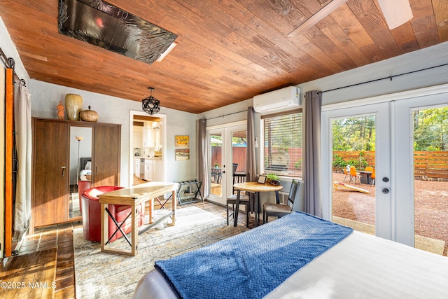 1125 Trails End Dr, Sedona, AZ 86336 - bedroom featuring french doors, a wall unit AC, wood ceiling, access to outside, and hardwood / wood-style floors