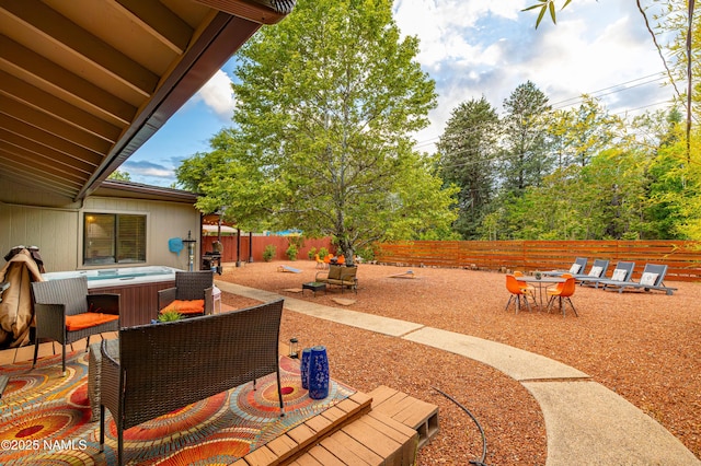 1125 Trails End Dr, Sedona, AZ 86336 - fenced backyard featuring outdoor dining space, a patio area, and a hot tub
