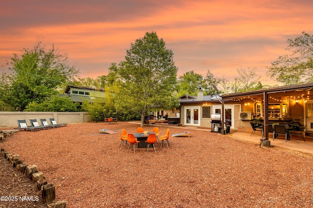 1125 Trails End Dr, Sedona, AZ 86336 - view of yard featuring french doors, a patio, and outdoor dining area