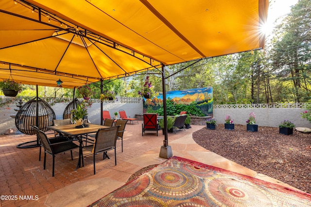 1125 Trails End Dr, Sedona, AZ 86336 - fenced backyard with outdoor dining space, a gazebo, and a patio area