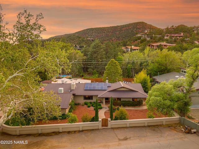 1125 Trails End Dr, Sedona, AZ 86336 - aerial view of property and surrounding area featuring a mountain backdrop