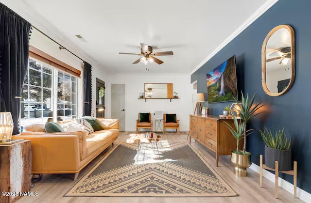 420 W Navajo Rd, Flagstaff, AZ 86001 - living area featuring ceiling fan, wood finished floors, crown molding, and baseboards