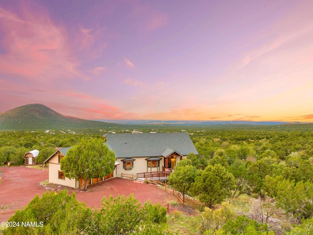 aerial view at dusk with a mountain view