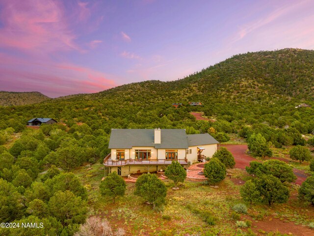 exterior space featuring a mountain view